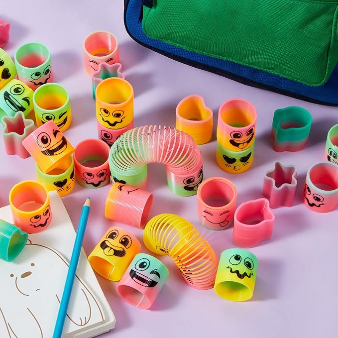 JOYIN 120 Pcs Spring Rainbow Party Favor, Mini Plastic Coil Spring Toy, Fidget Stress Coil Mini Springs Bulk Toys for Carnival Prize Birthday, Easter Goodie Bag Stuffers